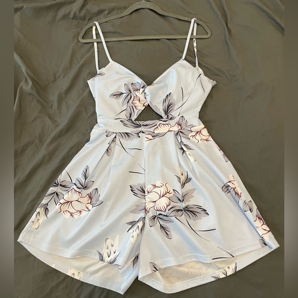 NWOT Blue Floral Twist Front Romper Shorts with Cut Out and Adjustable Tie Back
